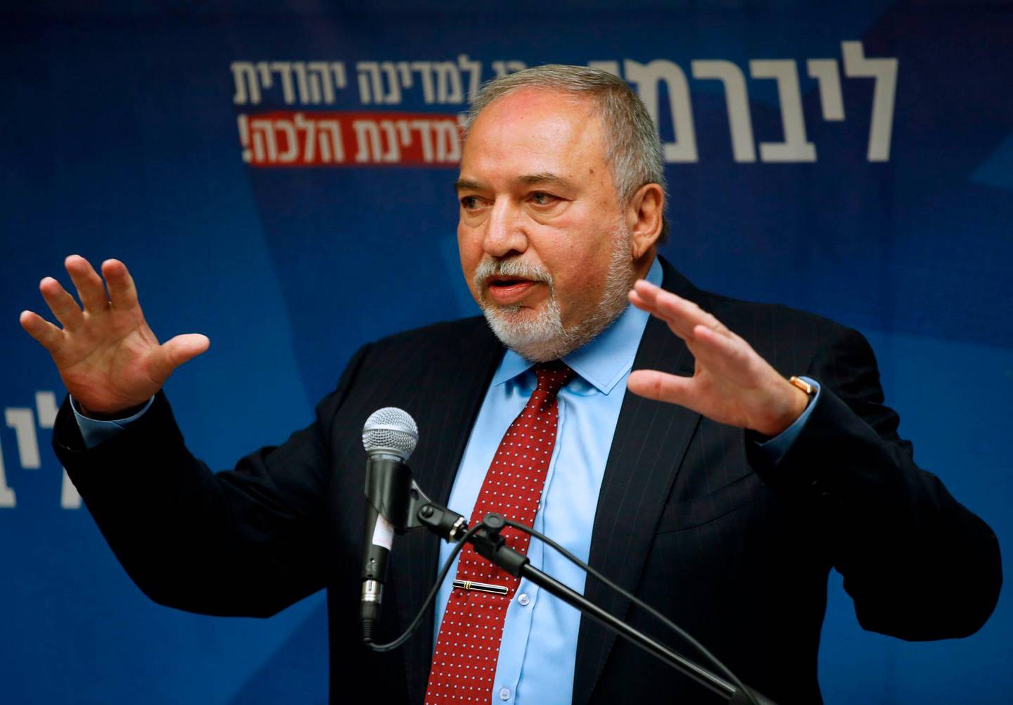 Yisrael Beitenu's party head Avigdor Lieberman delivers a statement to the press on December 11, 2019 in Jerusalem. - Israeli lawmakers gave initial approval today to a bill that would dissolve parliament and set the third general election in a year for the beginning of March. The bill, which passed the preliminary vote 50-0, comes ahead of a midnight (2200 GMT) deadline to form a new coalition, and would set the date for polls as March 2 next year. It faces two more plenary votes before being passed. (Photo by Menahem KAHANA / AFP)