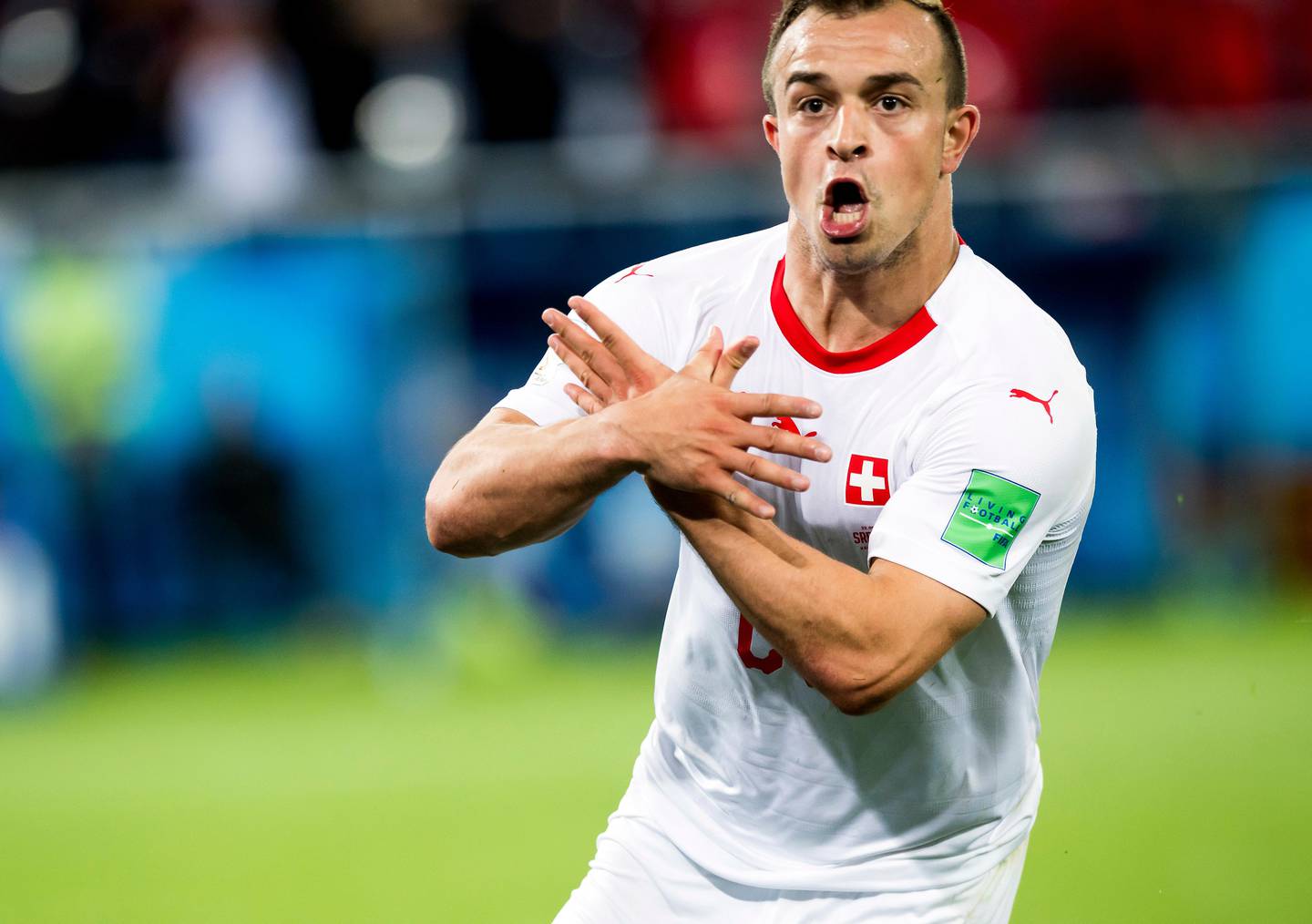 Switzerland's Xherdan Shaqiri celebrates after scoring his side's second goal during the group E match between Switzerland and Serbia at the 2018 soccer World Cup in the Kaliningrad Stadium in Kaliningrad, Russia, Friday, June 22, 2018. (Laurent Gillieron/Keystone via AP)