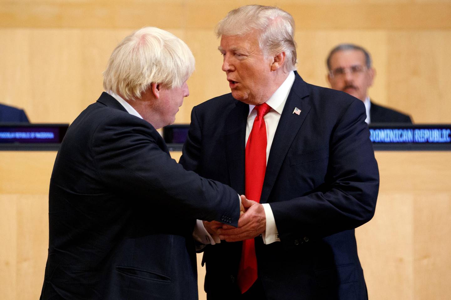President Donald Trump shakes hands with British Foreign Secretary Boris Johnson during the "Reforming the United Nations: Management, Security, and Development" meeting during the United Nations General Assembly, Monday, Sept. 18, 2017, in New York. (AP Photo/Evan Vucci)