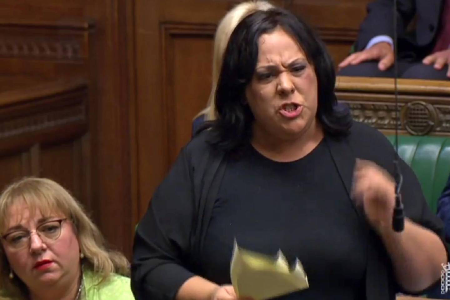 A video grab from footage broadcast by the UK Parliament's Parliamentary Recording Unit (PRU) shows British Labour Prty MP Paula Sherriff questioning the prime minister on his use of the word "Surrender" to describe the "Benn Bill"  in the House of Commons in central London on September 25, 2019. - Britain's parliament resumed on Wednesday after the Supreme Court ruled that Prime Minister Boris Johnson's order to suspend it was "unlawful, void and of no effect". Johnson, who has vowed to press ahead with his plans for Brexit on October 31, was due to address MPs later on Wednesday. (Photo by HO / various sources / AFP) / RESTRICTED TO EDITORIAL USE - MANDATORY CREDIT " AFP PHOTO / PRU " - NO USE FOR ENTERTAINMENT, SATIRICAL, MARKETING OR ADVERTISING CAMPAIGNS - EDITORS NOTE THE IMAGE HAS BEEN DIGITALLY ALTERED AT SOURCE TO OBSCURE VISIBLE DOCUMENTS