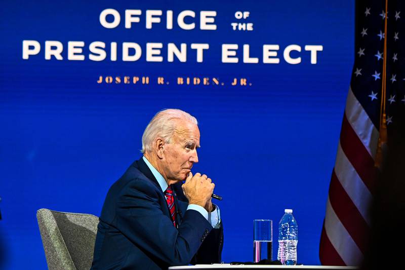 US President-elect Joe Biden participates in a virtual meeting with the United States Conference of Mayors at the  Queen in Wilmington, Delaware, on November 23, 2020. - US President-elect Joe Biden on Monday named the deeply experienced Antony Blinken for secretary of state, also nominating the first female head of intelligence and a czar for climate issues, with a promise to a return to expertise after the turbulent years of Donald Trump. (Photo by CHANDAN KHANNA / AFP)