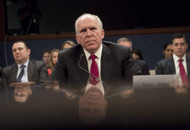 (FILES) In this file photo taken on May 23, 2017, former CIA Director John Brennan testifies during a House Permanent Select Committee on Intelligence hearing about Russian actions during the 2016 election on Capitol Hill in Washington, DC. - Former CIA chief John Brennan doubled down August 19, 2018 on his charge that Donald Trump has engaged in "treasonous" behavior and called on Congress to block the US president's attempts to strip other intelligence officials of their security clearances. Brennan has received an outpouring of support from former top-ranking intelligence officers -- but not much from Republican lawmakers -- since Trump revoked his top secret security clearance last week in retaliation for what the president called "unfounded and outrageous allegations." (Photo by SAUL LOEB / AFP)