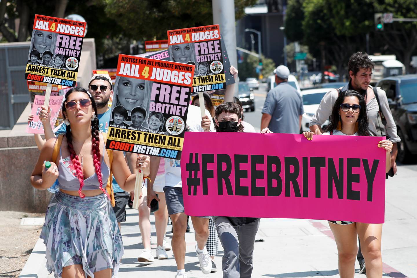 People protest in support of pop star Britney Spears on the day of a conservatorship case hearing at Stanley Mosk Courthouse in Los Angeles, California, U.S., July 14, 2021.  REUTERS/Mario Anzuoni
