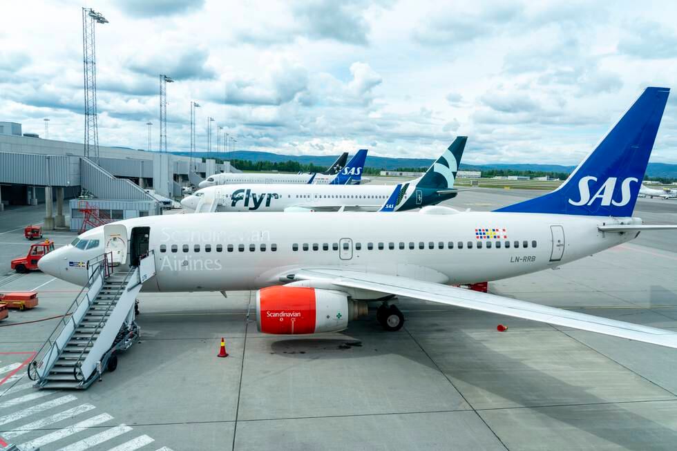 Konflikten mellom flyteknikerne og arbeidsgiverne fører søndag til mange innstilte avganger fra norske flyplasser. Foto: Gorm Kallestad / NTB