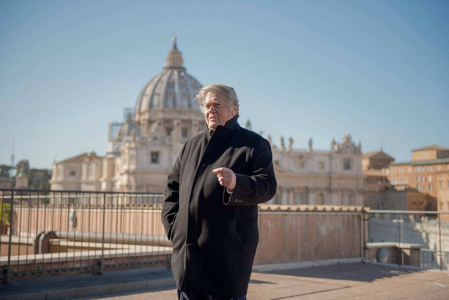 In this picture taken Saturday, Feb. 23, 2019, former White House strategist Steve Bannon poses for portraits during a break of his media activities on a terrace overlooking St. Peter's Square at the Vatican. (AP Photo/Marco Bonomo)