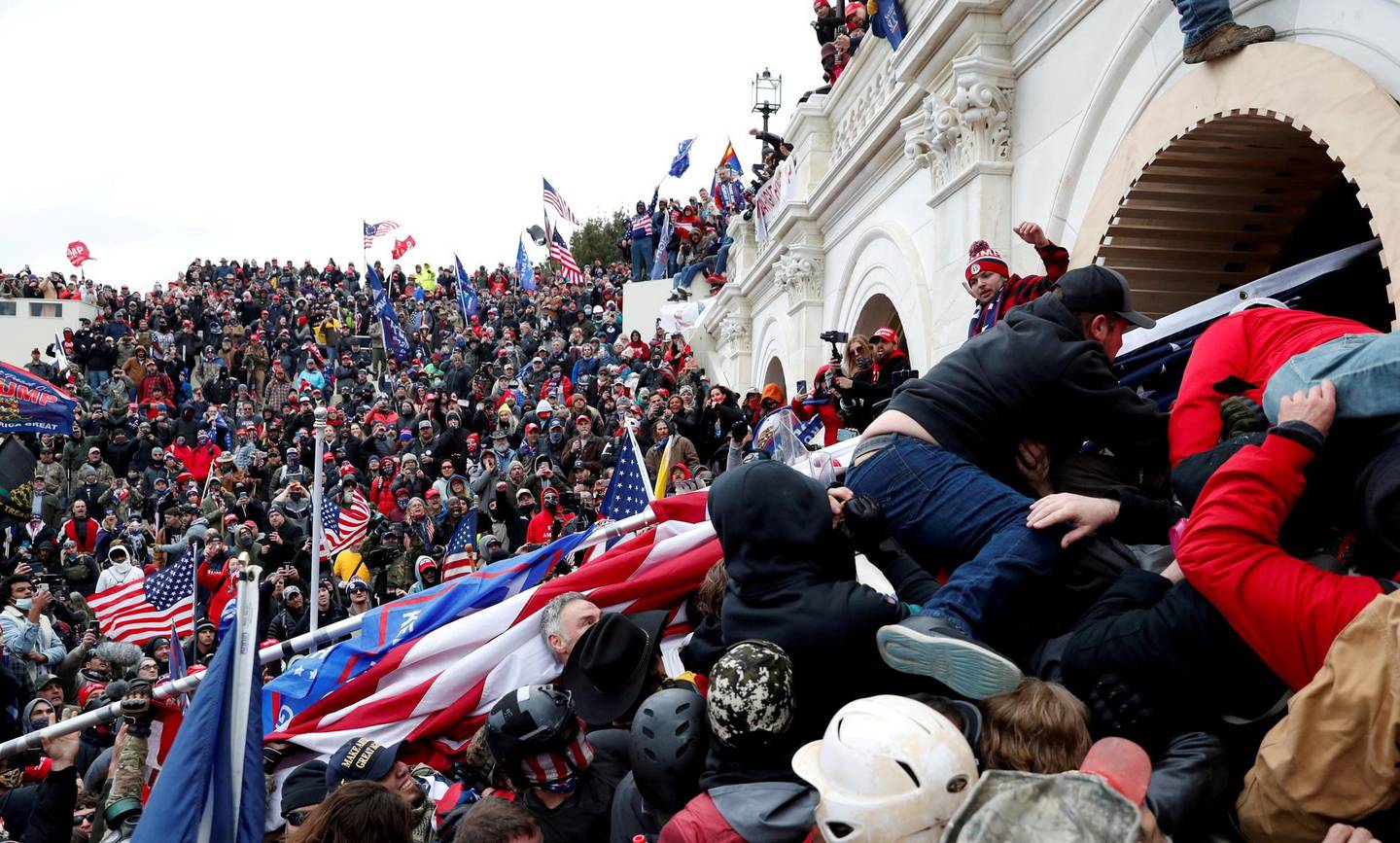 FILE PHOTO: Pro-Trump protesters storm into the U.S. Capitol during clashes with police, during a rally to contest the certification of the 2020 U.S. presidential election results by the U.S. Congress, in Washington, U.S, January 6, 2021. REUTERS/Shannon Stapleton/File Photo