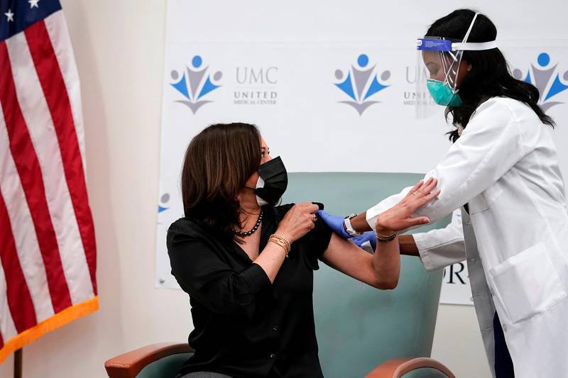 Vice President-elect Kamala Harris thanks nurse Patricia Cummings after she received the Moderna COVID-19 vaccine from Cummings, Tuesday Dec. 29, 2020, at United Medical Center in southeast Washington. (AP Photo/Jacquelyn Martin)