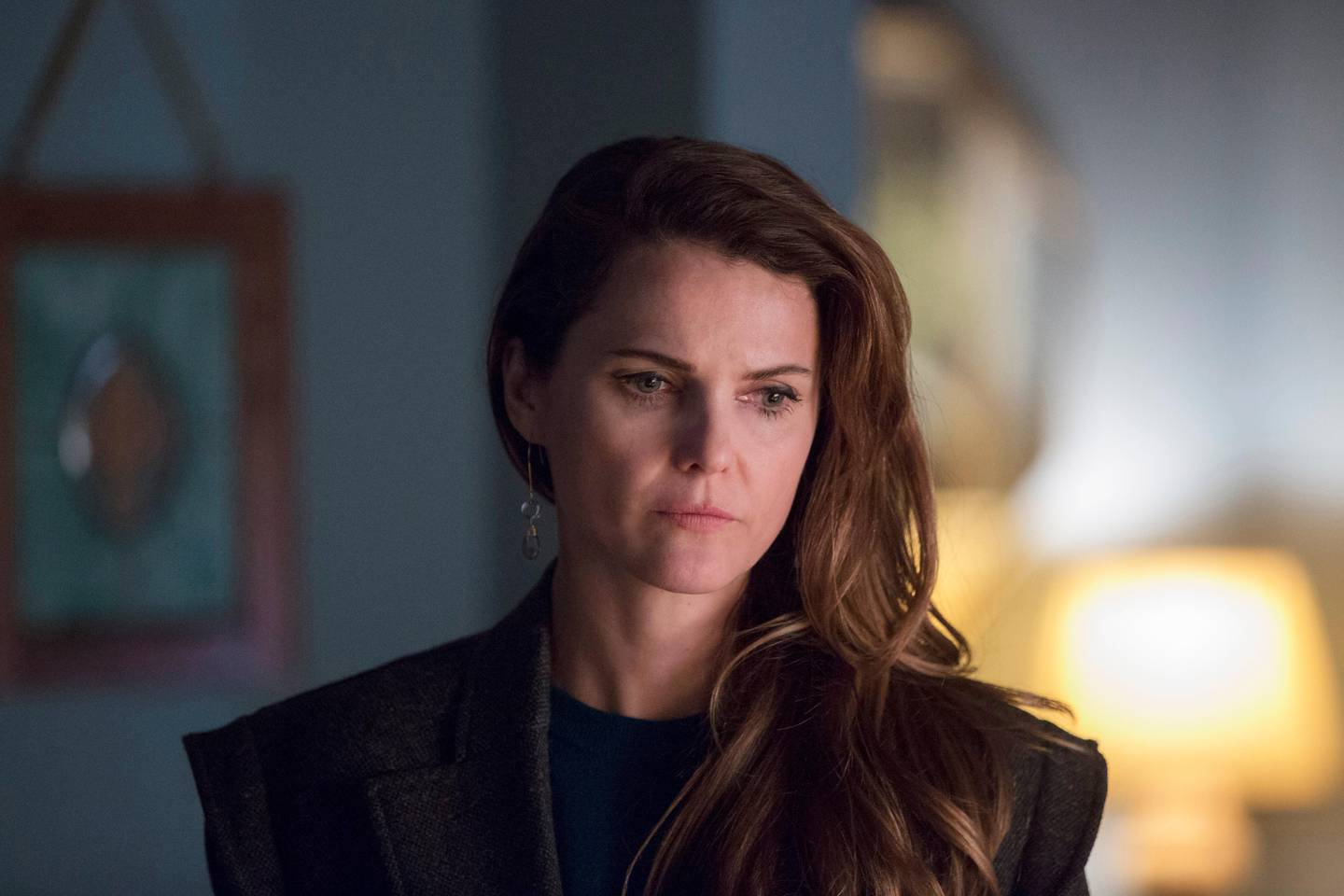 This image released by FX shows Keri Russell in a scene from "The Americans." On Thursday, Dec. 6, 2018,  Russell was nominated for a Golden Globe award for lead actress in a drama series for her role in the series. The 76th Golden Globe Awards will be held on Sunday, Jan. 6. (Eric Liebowitz/FX via AP)