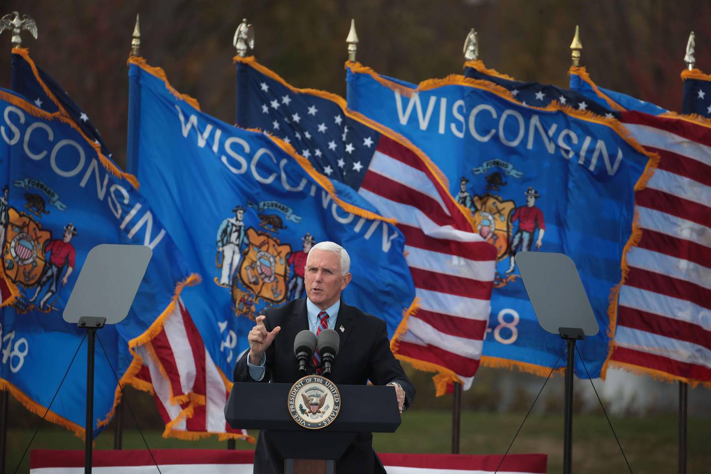 WAUKESHA, WISCONSIN - OCTOBER 13: Vice President Mike Pence speaks to supporters during a rally at Weldall Manufacturing on October 13, 2020 in Waukesha, Wisconsin. A recent poll has former Vice President Joe Biden leading President Donald Trump in Wisconsin, a state with one of the highest Covid-19 infection rates in the nation, by 10 points,   Scott Olson/Getty Images/AFP
== FOR NEWSPAPERS, INTERNET, TELCOS & TELEVISION USE ONLY ==