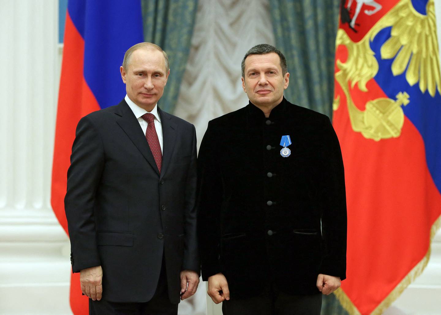 Presidenten og hans propagandist: Vladimir Putin og Vladimir Solovyov, her fra 2013.