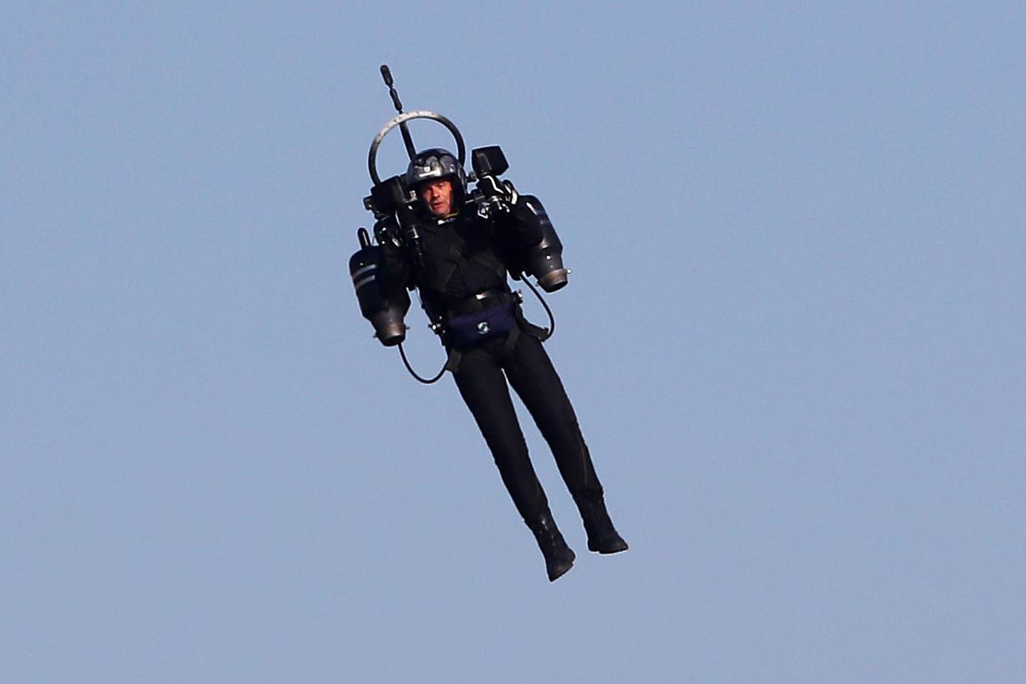 (FILES) In this file photo taken on April 21, 2018 "Jetpack Man" flies during the 2018 Red Bull Air Race World Championships in Cannes. - The Federal Bureau of Investigation said September 1, 2020 it had launched a probe after pilots landing at Los Angeles airport over the weekend reported seeing a person in a jet pack flying right next to them. (Photo by VALERY HACHE / AFP)