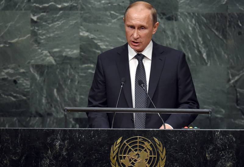 Russlands president Vladimir Putin snakket til en fullsatt sal i FN, da han for første  gang på ti år deltok i åpningen av FNs generalforsamling. FOTO: TIMOTHY A. CLARY/NTB SCANPIX