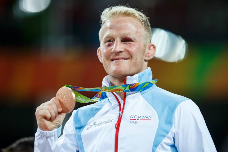 Stig-Andre Berge med medaljen to tok tre OL å ta.