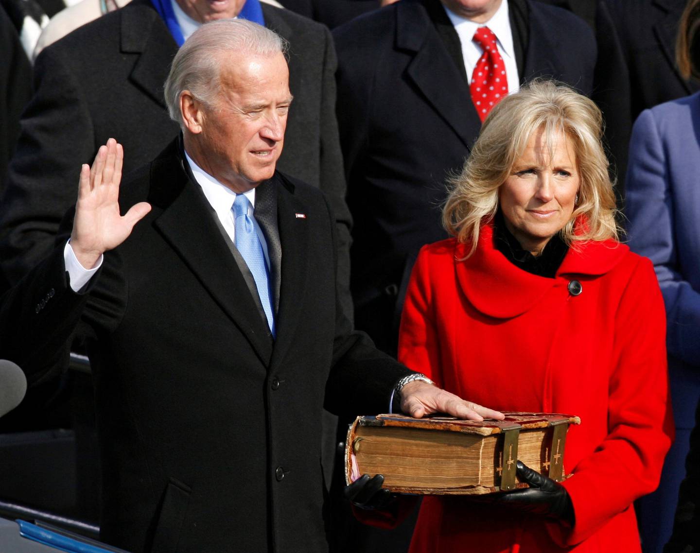 FILE PHOTO: U.S. Vice President Joe Biden is sworn in as his wife Jill watches during the inauguration ceremony for President Barack Obama in Washington January 20, 2009.     REUTERS/Jim Bourg/File Photo