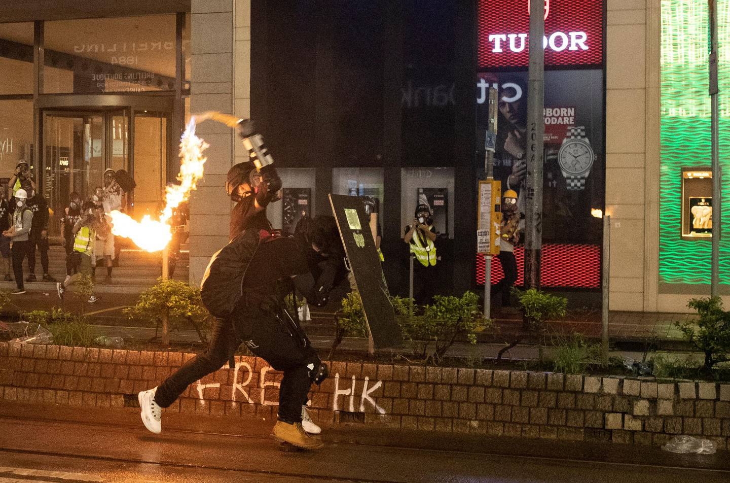 A demonstrator throws a molotov cocktail at police during a protest in Hong Kong, China August 31, 2019. REUTERS/Danish Siddiqui