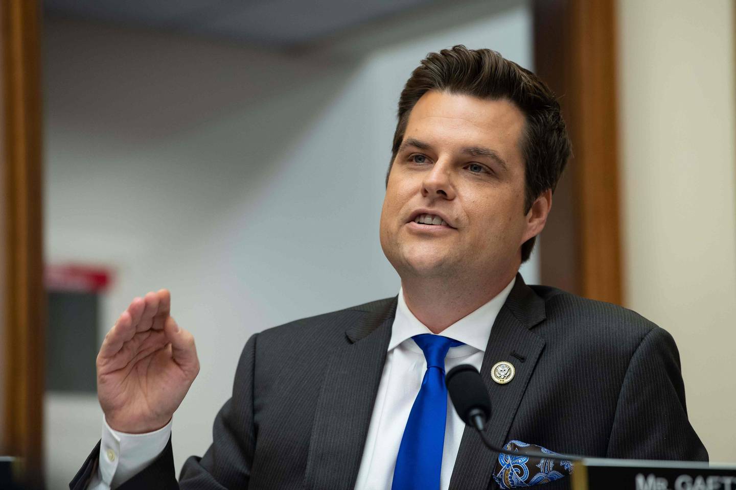 (FILES) In this file photo taken on May 8, 2019 US Republican Representative from Florida Matt Gaetz speaks during a markup of a resolution supporting the committee report on Attorney General William Barr's failure to produce the unredacted Mueller report and underlying materials on Capitol Hill in Washington, DC. - Furious about being left out of the Donald Trump impeachment process, US congressional Republicans stormed a closed-door witness deposition on October 23, 2019 and refused to leave for several hours in an escalation of the showdown. "BREAKING: I led over 30 of my colleagues into the SCIF where (House Intelligence Committee chairman) Adam Schiff is holding secret impeachment depositions. Still inside - more details to come," tweeted congressman Matt Gaetz, a fierce Trump defender. (Photo by NICHOLAS KAMM / AFP)