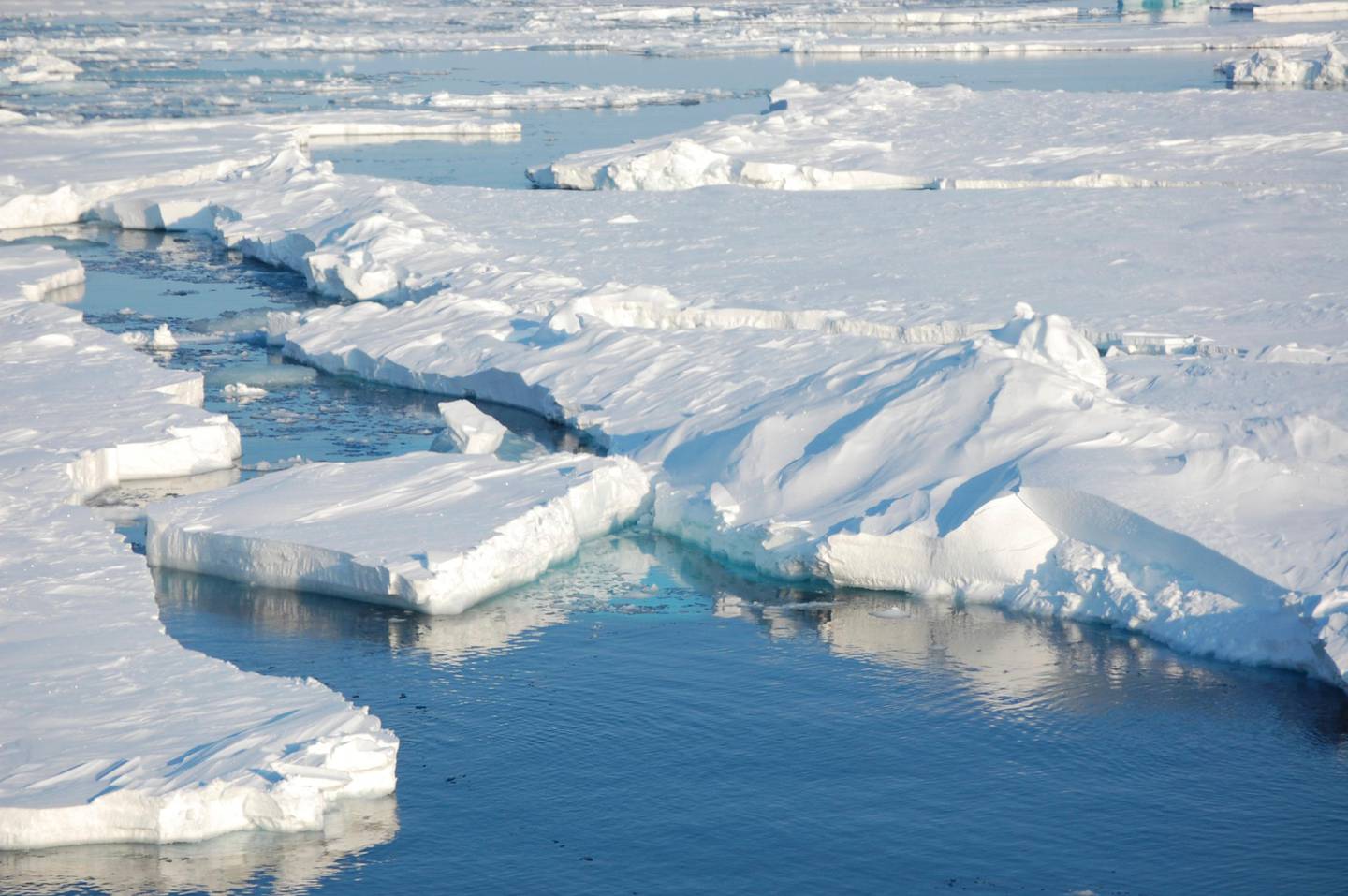 In this photo provided by Dirk Notz, taken April 24, 2009, ice floats in the Arctic near Svalbard, Norway. At current carbon emission levels, the Arctic will likely be free of sea ice in September around mid-century, which could make weather even more extreme and strand some polar animals, a study published Thursday in the journal Science finds. (Dirk Notz via AP)