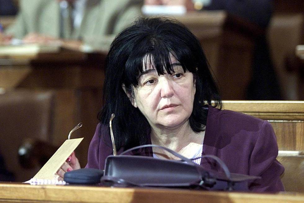 (FILES) File picture dated 24 July 2001 shows Mira Markovic, wife of former Yugoslav president Slobodan Milosevic, during a session in the parliament in Belgrade. Serbia has withdrawn an international arrest warrant against Mira Markovic, fugitive wife of former Yugoslav president and war crimes indictee Slobodan Milosevic, a court official said 31 May 2005. "The (international) arrest warrant is no longer in force after the defense lawyer has promised that the defendant, Mira Markovic, will appear at the trial scheduled in September," a spokeswoman for Belgrade's district court Ivana Ramic told AFP. However, the national arrest warrant remains in force and Markovic will be arrested if and when she returns to Serbia-Montenegro, said Ramic. Markovic could then be released on bail pending the verdict in her trial.     AFP PHOTO/FILES/KOCA SULEJMANOVIC