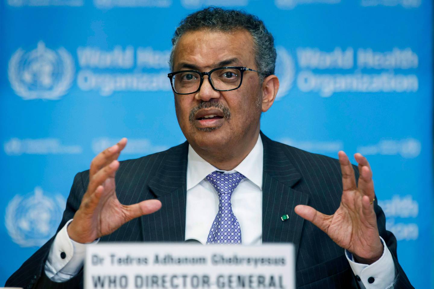 FILE - In this Monday, March 9, 2020 file photo, Tedros Adhanom Ghebreyesus, Director General of the World Health Organization speaks during a news conference on updates regarding COVID-19, at the WHO headquarters in Geneva, Switzerland. The head of the World Health Organization said the U.N. health agency would not recommend any COVID-19 vaccine before it is proved safe and effective, even as Russia and China have started using their experimental vaccines before large studies have finished and other countries have proposed streamlining authorization procedures.  At a press briefing on Friday, Sept. 4, 2020, Tedros Adhanom Ghebreyesus said vaccines have been used successfully for decades and credited them with eradicating smallpox and bringing polio to the brink of being eliminated.(Salvatore Di Nolfi/Keystone via AP, file)