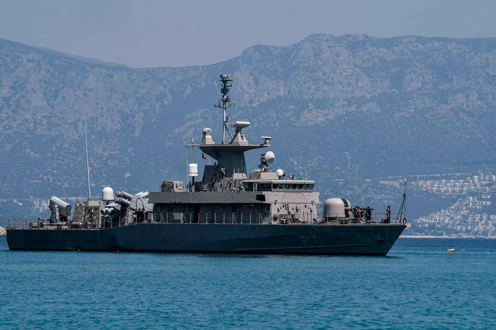 The Hellenic Navy Roussen or Super Vita class Fast Missile Patrol Boat P 71 HS Ritsos is seen off the tiny Greek island of Kastellorizo, officially Megisti, the most southeastern inhabited Greek island in the Dodecanese, situated two kilometers off the south coast of Turkey where the Kas Turkish resort can be seen on August 28, 2020. (Photo by Louisa GOULIAMAKI / AFP)