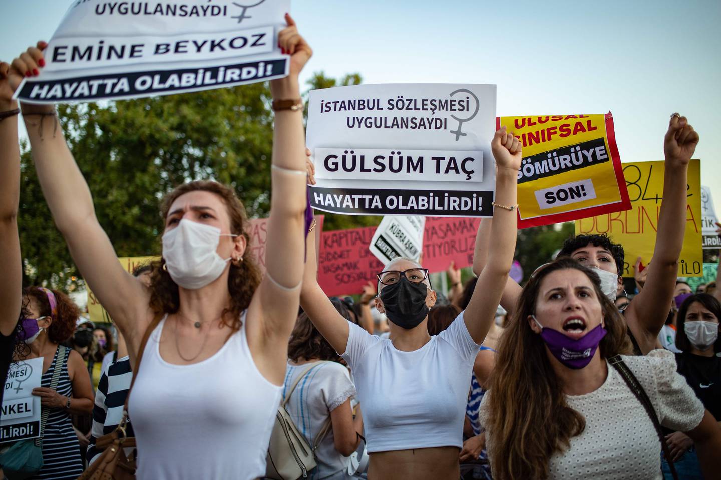 Demonstrators wearing protective face masks hold up placards with names of women during a demonstration for a better implementation of the Istanbul Convention and the Turkish Law 6284 for the protection of the family and prevention of violence against women, in Istanbul, Turkey, on August 5, 2020. (Photo by Yasin AKGUL / AFP)