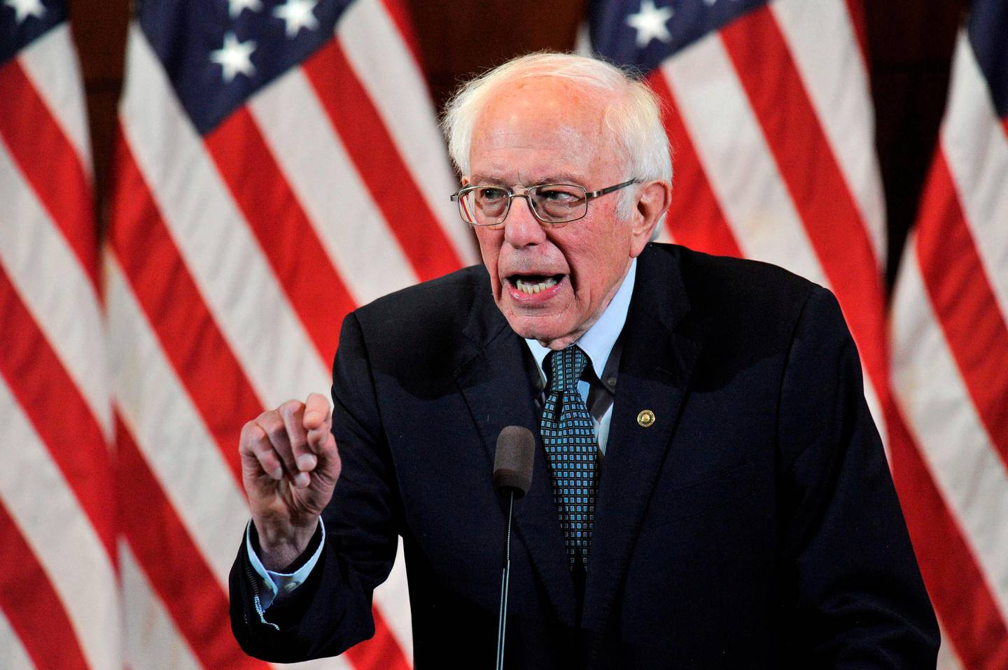 US Presidential Candidate and US Senator Bernie Sanders gives his response to US President Donald Trump's State of the Union speech to a room of supporters at the Currier Museum of Art Auditorium in Manchester, New Hampshire on February 4, 2020. - Democratic White House candidate Pete Buttigieg seized a shock lead in the chaotic Iowa caucuses, closely trailed by leftist senator Bernie Sanders, according to partial returns released on Tuesday after an embarrassing delay in reporting the results. (Photo by Joseph Prezioso / AFP)