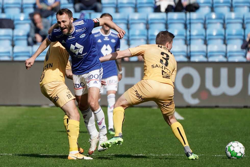 Moldes kaptein Magnus Wolff Eikrem og Bodø/Glimts Alfons Sampsted i duell under cupfinalen – foran altfor glisne tribuner.