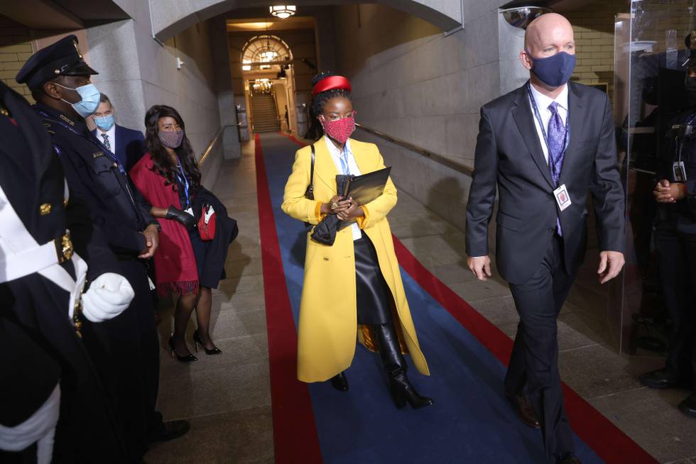 WASHINGTON, DC - JANUARY 20: Youth Poet Laureate Amanda Gorman arrives at the inauguration of U.S. President Joe Biden on the West Front of the U.S. Capitol on January 20, 2021 in Washington, DC. During today's inauguration ceremony Joe Biden becomes the 46th president of the United States.   Win McNamee/Getty Images/AFP
== FOR NEWSPAPERS, INTERNET, TELCOS & TELEVISION USE ONLY ==