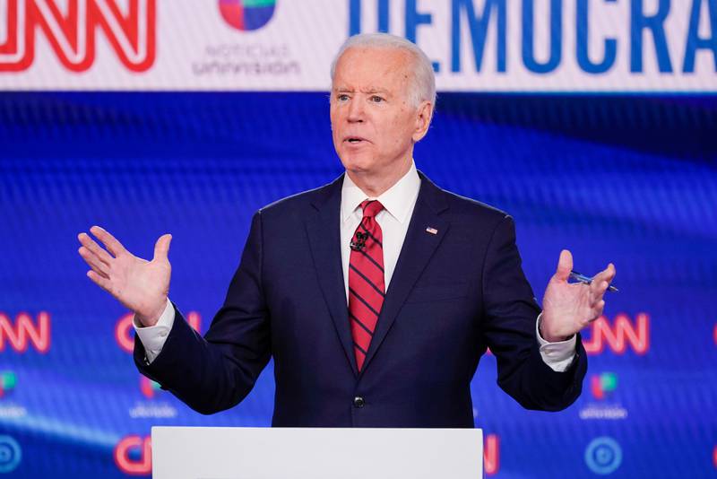 FILE - In this March 15, 2020, file photo, former Vice President Joe Biden, participates in a Democratic presidential primary debate at CNN Studios in Washington. Biden has won the presidential primary in Hawaii. The results were announced Saturday, May 23, 2020. The party-run primary was delayed by more than a month because of the coronavirus. (AP Photo/Evan Vucci, File)