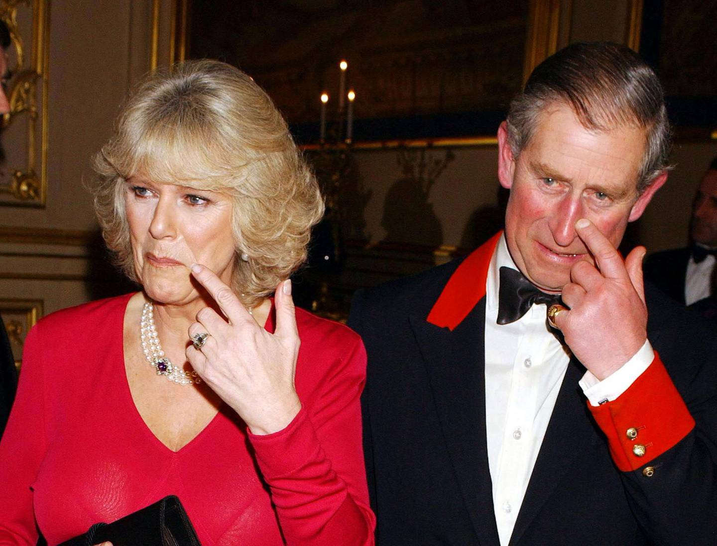 Prince Charles and Camilla Parker Bowles arrive for a party at Windsor Castle after announcing their engagement earlier 10 February, 2005.  Britain's Prince Charles and his longtime companion Camilla Parker Bowles are to marry, his office announced Thursday, putting the official seal on a relationship that first blossomed 35 years ago.     AFP PHOTO/JOHN STILLWELL/WPA POOL