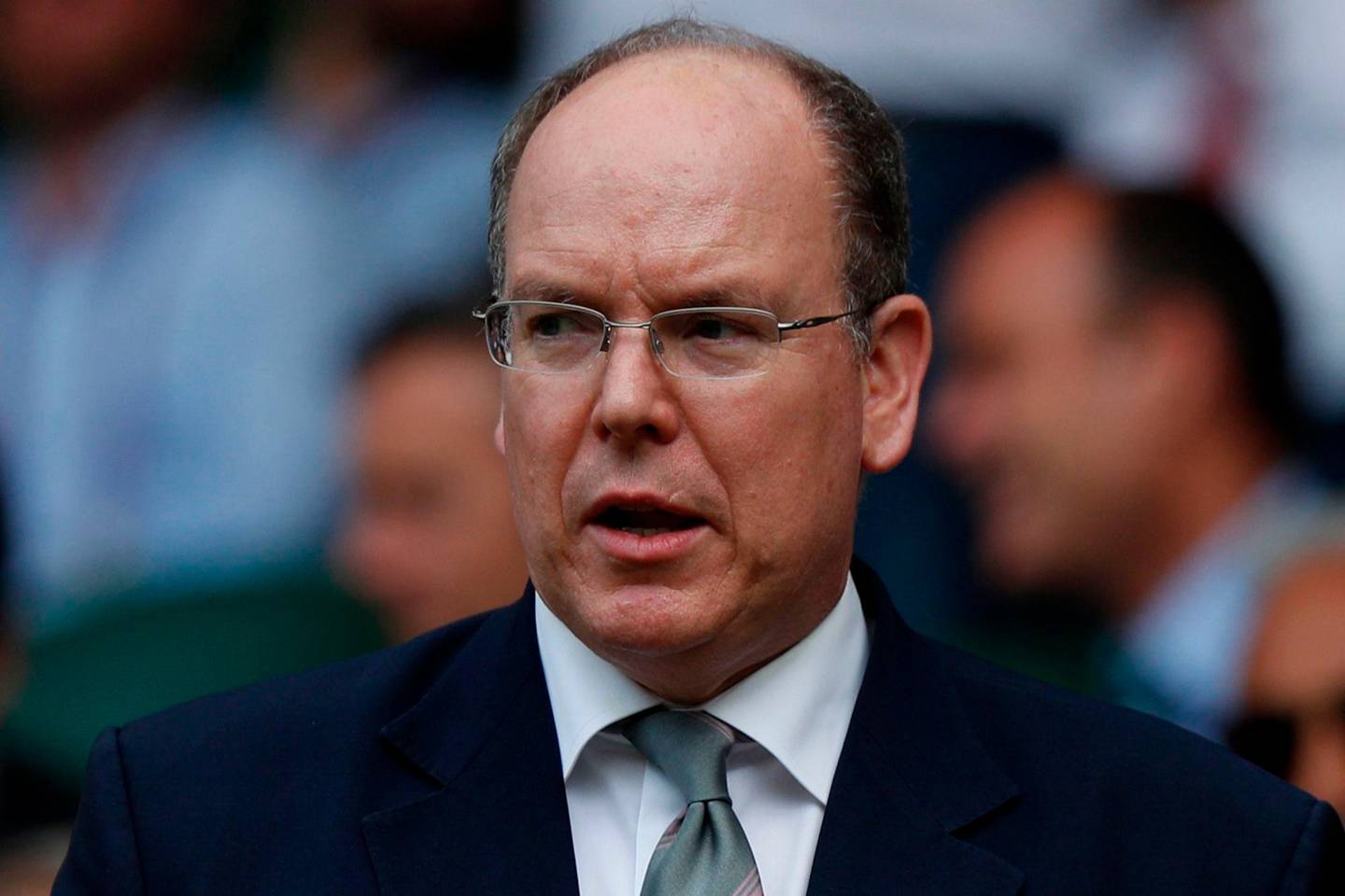 (FILES)This file photo taken on July 10, 2019 shows Prince Albert II of Monaco attending a match at the 2019 Wimbledon Championships at The All England Lawn Tennis Club in Wimbledon, southwest London. - Monaco's Prince Albert II has tested positive for the novel coronavirus, the principality said in a statement on March 19, 2020, adding there were "no concerns for his health". (Photo by Adrian DENNIS / AFP) / RESTRICTED TO EDITORIAL USE
