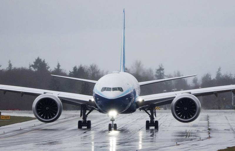 A Boeing 777X airplane taxis during an attempted first test flight from the company's plant in Everett, Washington, U.S. January 24, 2020. The test flight was postponed for a second day in a row due to weather. REUTERS/Lindsey Wasson