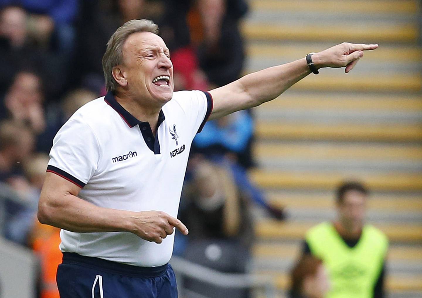 (FILES) In a file picture taken on October 4, 2014 Crystal Palace's English manager Neil Warnock gestures during the English Premier League football match between Hull City and Crystal Palace at the KC Stadium in Kingston upon Hull. Neil Warnock on December 27, 2014 became the first Premier League manager to lose his job this season when he was sacked by strugglers Crystal Palace. AFP PHOTO / LINDSEY PARNABY

RESTRICTED TO EDITORIAL USE. No use with unauthorized audio, video, data, fixture lists, club/league logos or "live" services. Online in-match use limited to 45 images, no video emulation. No use in betting, games or single club/league/player publications.