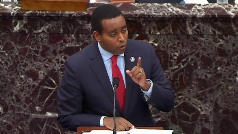 U.S. House impeachment manager Rep. Joe Neguse (D-CO) participates in the impeachment managers’ closing argument in the impeachment trial of former U.S. President Donald Trump on charges of inciting the deadly attack on the U.S. Capitol, on the floor of the Senate chamber on Capitol Hill in Washington, U.S., February 11, 2021. U.S. Senate TV/Handout via Reuters EDITORIAL USE ONLY  NO COMMERCIAL SALES