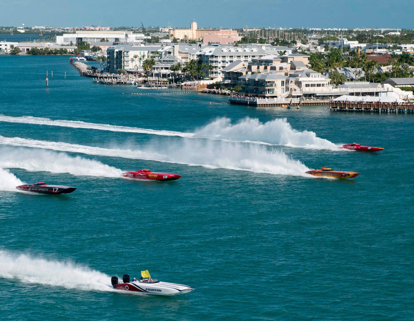 This image courtesy of the Florida Keys News Bureau, Superboat Unlimited-class boats cross the start line on November 7, 2018, at the Key West World Championship in Key West, Florida. - The event, with additional race days scheduled November 9 and 11, has attracted 39 entries that are divided into seven classes. (Photo by Rob O'Neal / Florida Keys News Bureau / AFP) / RESTRICTED TO EDITORIAL USE - MANDATORY CREDIT "AFP PHOTO / Florida Keys News Bureau/ Rob O' Neal" - NO MARKETING NO ADVERTISING CAMPAIGNS - DISTRIBUTED AS A SERVICE TO CLIENTS