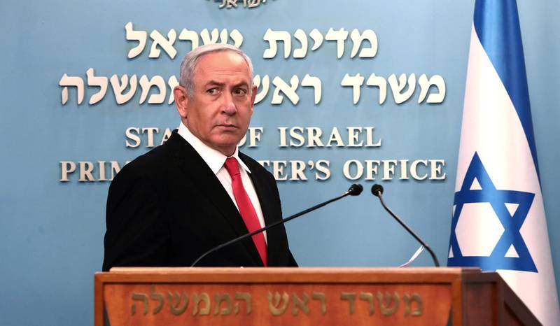 FILE PHOTO: Israeli Prime Minister Benjamin Netanyahu delivers a speech at his Jerusalem office, regarding the new measures that will be taken to fight the coronavirus, March 14, 2020. Gali Tibbon/Pool via REUTERS/File Photo