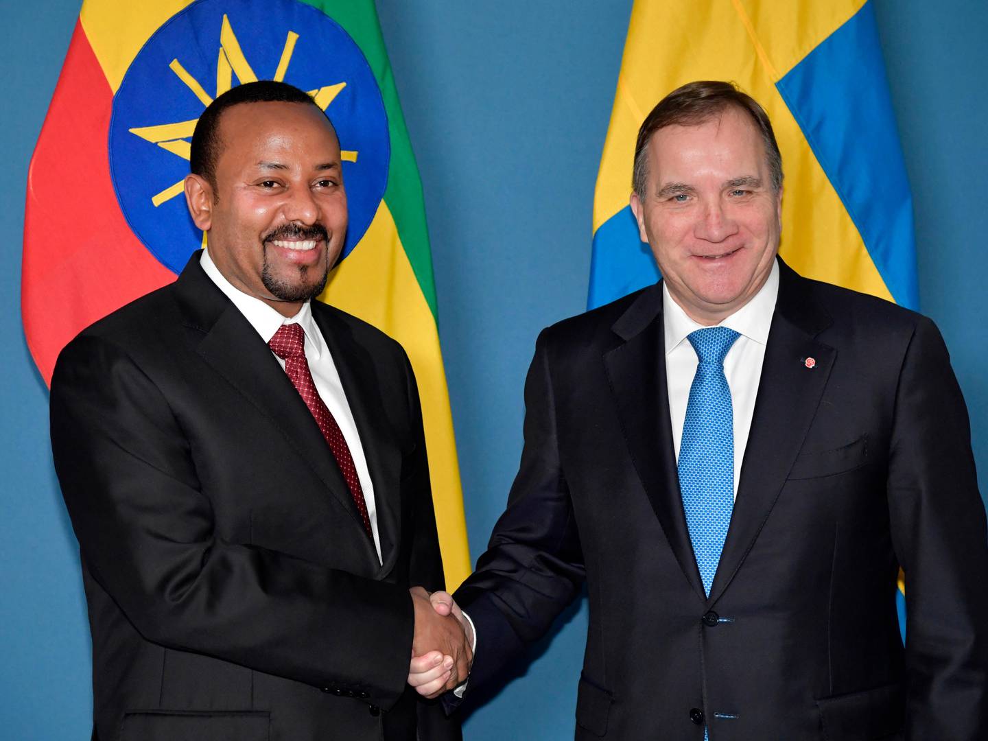 Sweden's Prime Minister Stefan Lofven, right, welcomes Ethiopia's Prime Minister Abiy Ahmed Ali for a meeting in Stockholm, Sweden, Monday Dec. 9, 2019. (Anders Wiklund/TT via AP)