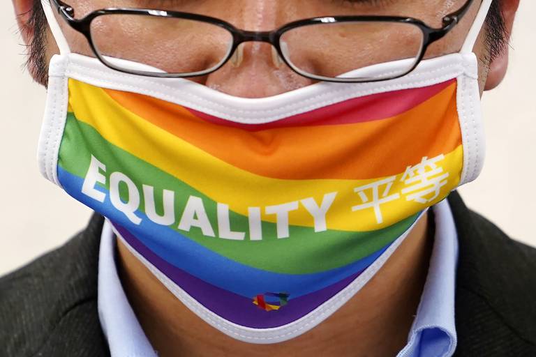 «Likhet», står det på munnbindet til Yuichi Kamiya, som er lederen for Japans LHBT-organisasjon.
