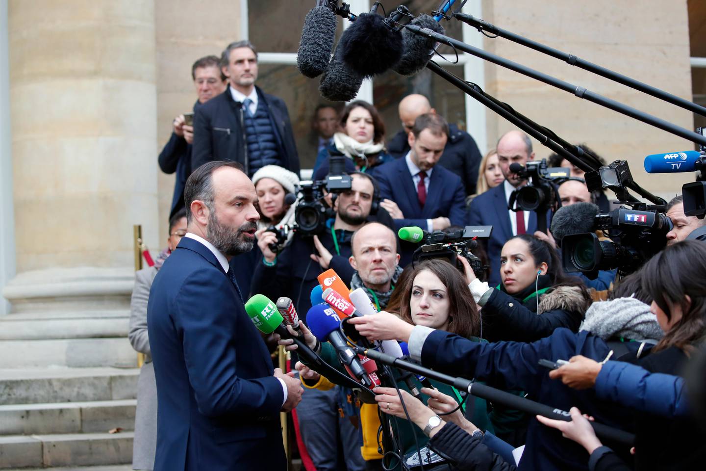 French Prime Minister Edouard Philippe delivers a statement after a meeting with unions representatives, in Paris Tuesday Jan. 7, 2020. Negotiations to end record-setting strikes that have hobbled France's train network and made commuting miserable for Parisians are resuming Tuesday between the government and unions. (AP Photo/Francois Mori)
