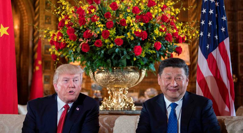 REAKSJONER: USAs angrep har overrasket internasjonalt, og kom midt                    under besøket til Kinas president Xi Jinping hos president Donald Trump i Florida. FOTO: JIM WATSON/NTB SCANPIX