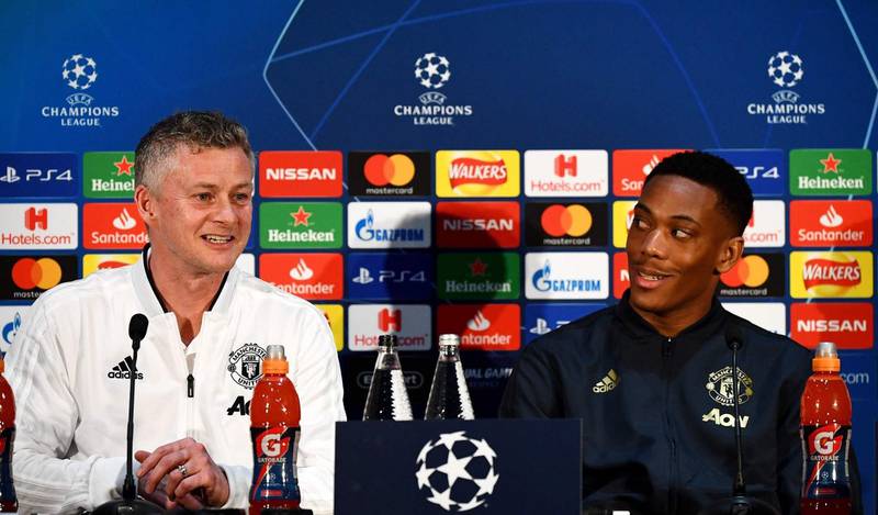Manchester United's  Norwegian caretaker manager Ole Gunnar Solskjaer (L) and Manchester United's French striker Anthony Martial attend a press conference at Old Trafford in Manchester, north west England, on February 11, 2019, on the eve the first leg of their UEFA Champions League football match against Paris Saint-Germain. (Photo by FRANCK FIFE / AFP)