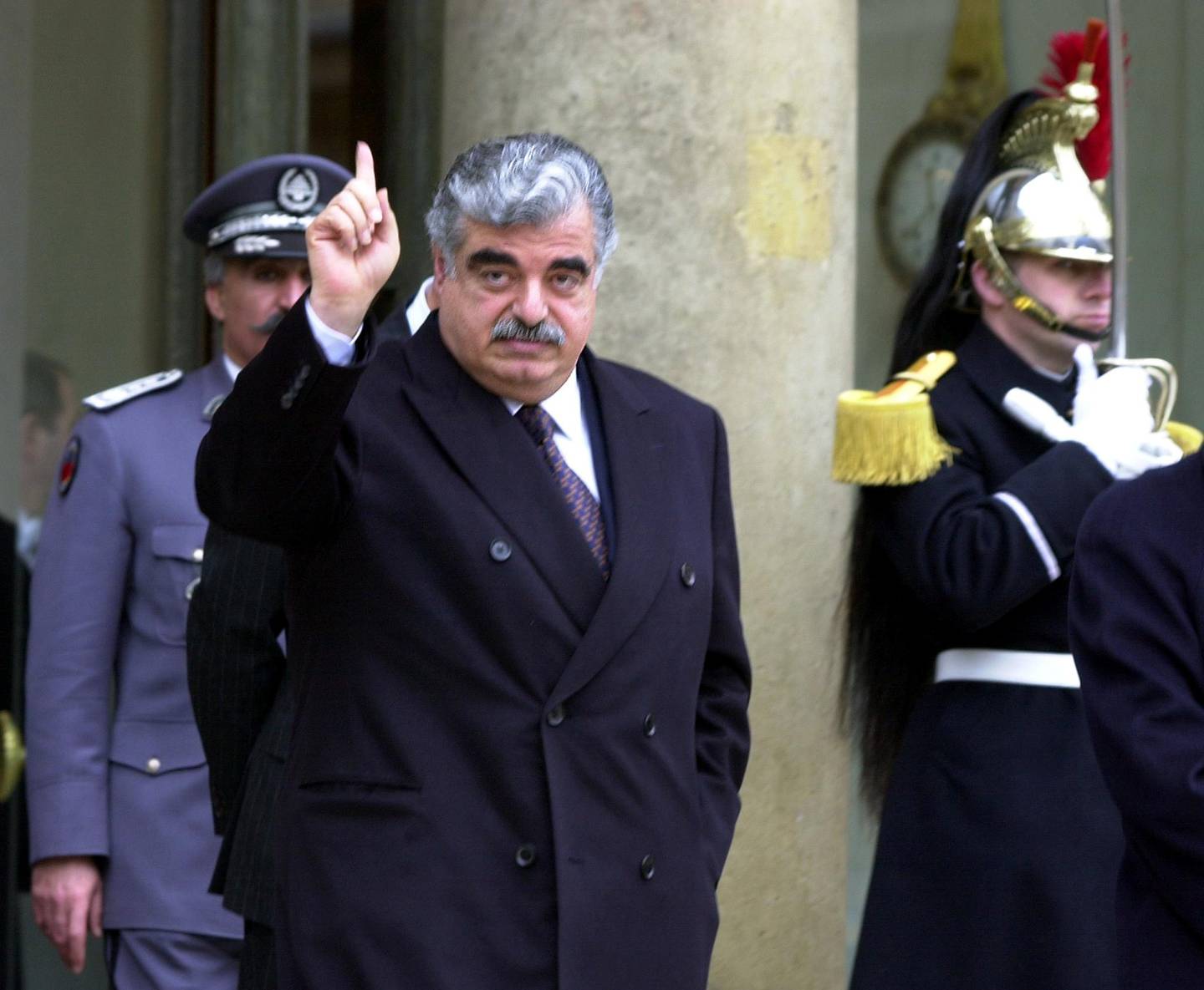 FILE PHOTO: Lebanese Prime Minister Rafik Hariri leaves the Elysee Palace following a meeting with French President Jacques Chirac in Paris, France February 27, 2001. REUTERS/Xavier Lhospice