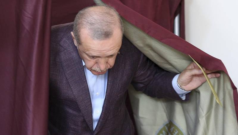 Turkey's President Recep Tayyip Erdogan casts his ballot at a polling station in Istanbul, Sunday, June 23, 2019. Polls have opened in a repeat election in Turkey's largest city where Erdogan and his political allies could lose control of Istanbul's administration for the first time in 25 years. (AP Photo/Emrah Gurel)