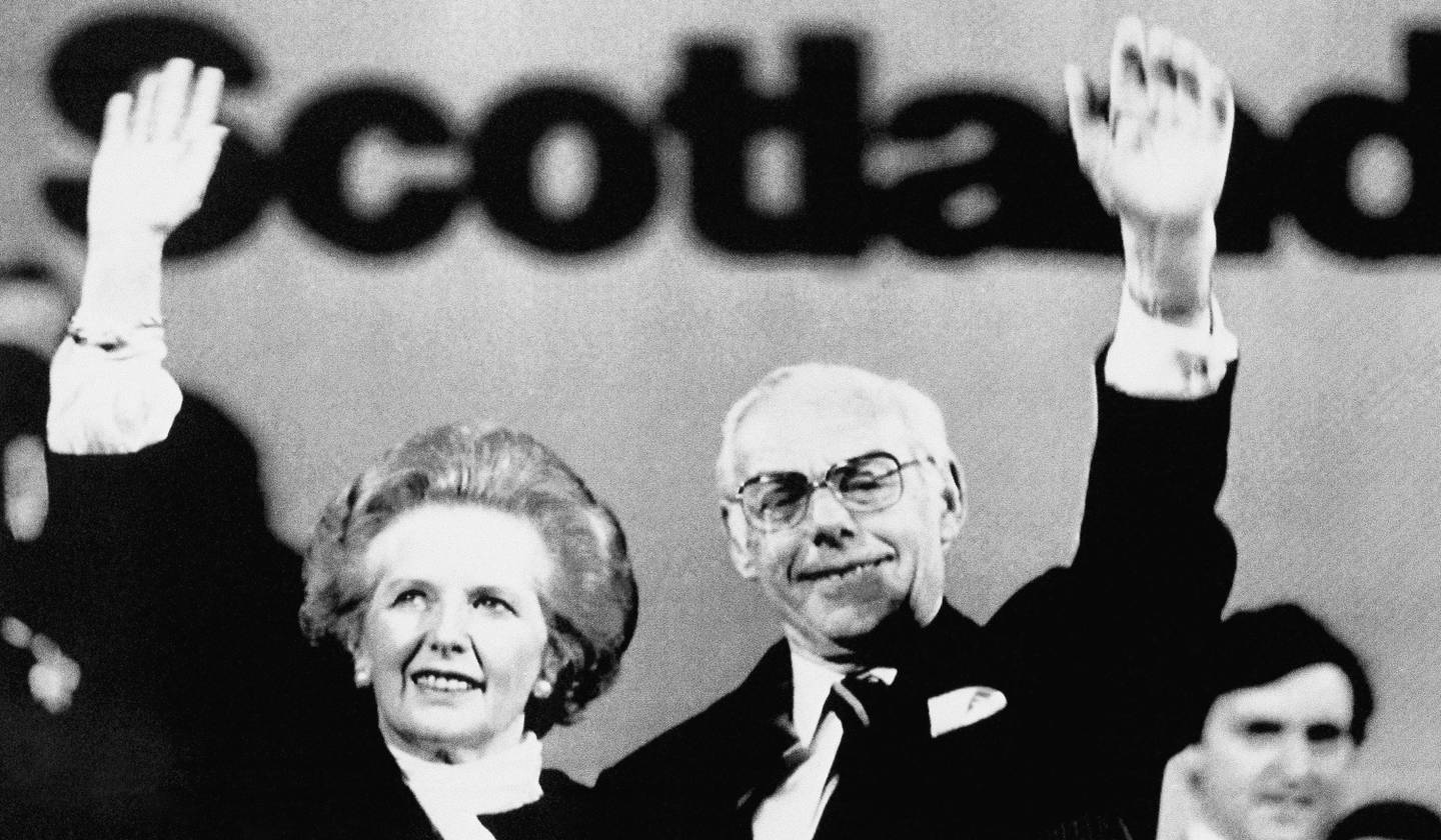 British Prime Minister Margaret Thatcher and her husband Denis wave to the audience after her speech at the Scottish Conservative conference on Friday, May 16, 1987 in Perth, Scotland. Thatcher has launched her general election campaign by promising more ?popular capitalism.? (AP Photo/Redman)