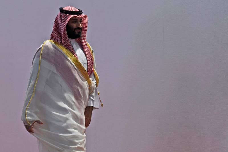 FILE - In this June 28, 2019 file photo, Saudi Arabia's Crown Prince Mohammed bin Salman arrives for the G-20 summit in Osaka, Japan. Saudi Arabia is renewing its push to publicly sell shares of Saudi Aramco, the state-owned oil firm thats seen as the countrys crown jewel. The crown prince is the architect of the effort to list Aramco, touting it as a way to raise capital for the kingdom's sovereign wealth fund, which would then develop new cities and lucrative projects across Saudi Arabia. (AP Photo/Susan Walsh, File)