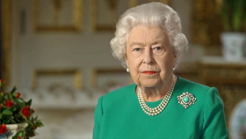 In this image taken from video and made available by Buckingham Palace, Britain's Queen Elizabeth II addresses the nation and the Commonwealth from Windsor Castle, Windsor, England, Sunday April 5, 2020. Queen Elizabeth II made a rare address, calling on Britons to rise to the challenge of the coronavirus pandemic, to exercise self-discipline in an increasingly challenging time. (Buckingham Palace via AP)
