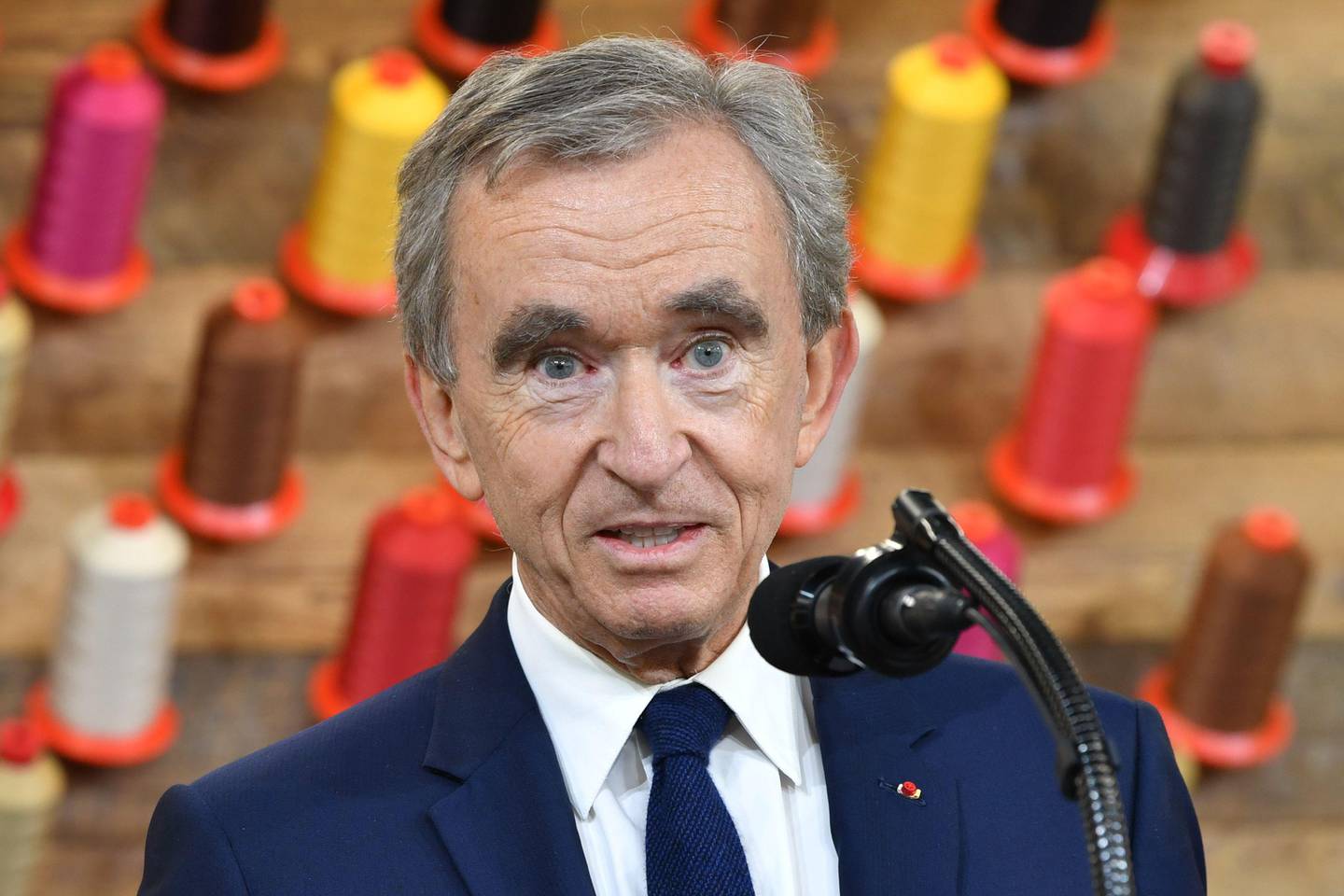 (FILES) In this file photo taken on October 17, 2019 Chief Executive of LVMH (Louis Vuitton Moet Hennessy) Bernard Arnault speaks during a visit to the new Louis Vuitton factory in Alvarado (40 miles south of Fort Worth), Johnson County, Texas. - LVMH and US jewellers Tiffany announced on November 25, 2019 a $16.2 billion tie-up that is the French luxury group's biggest-ever acquisition and will bolster its presence in the United States. The companies said in a statement they "have entered into a definitive agreement whereby LVMH will acquire Tiffany for $135 per share in cash, in a transaction with an equity value of approximately 14.7 billion euros or $16.2 billion." (Photo by Nicholas Kamm / AFP)