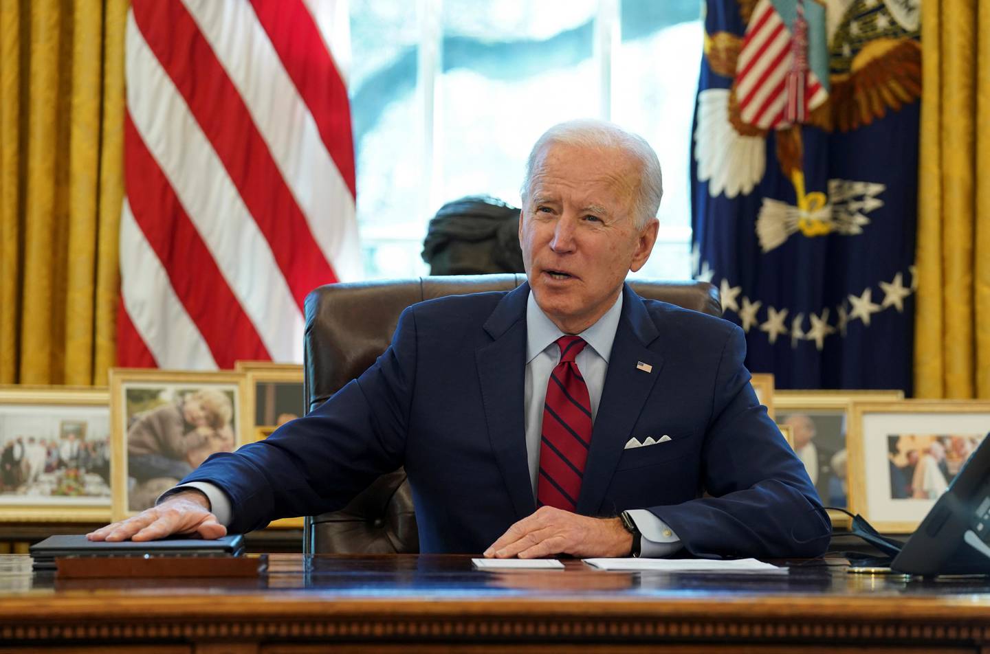 FILE PHOTO: U.S. President Joe Biden speaks before signing executive orders strengthening access to affordable healthcare at the White House in Washington, U.S., January 28, 2021. REUTERS/Kevin Lamarque/File Photo