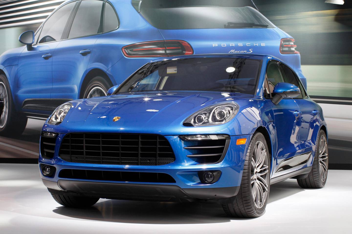 LOS ANGELES, CA - NOVEMBER 20: A Porsche Macan S is shown during media preview days at the 2013 Los Angeles Auto Show on November 20, 2013 in Los Angeles, California. The LA Auto Show was founded in 1907 and is one of the largest with more than 20 world debuts expected. The show will be open to the public November 22 through December 1.   David McNew/Getty Images/AFP
== FOR NEWSPAPERS, INTERNET, TELCOS & TELEVISION USE ONLY ==