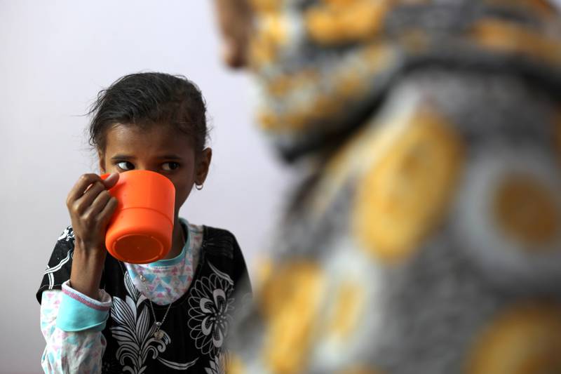 Ahmadiya Juaidi, 13, drinks a supplemental nutrition shake at malnutrition treatment ward of al-Sabeen hospital in Sanaa, Yemen February 24, 2021. REUTERS/Khaled Abdullah     TPX IMAGES OF THE DAY